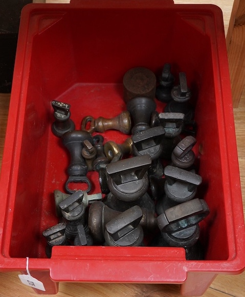 Twenty-four Georgian and later bronze bell weights, largest 7lb, some with Royal Cyphers for George IV, William IV, etc., weight marks, and other proof marks, etc.